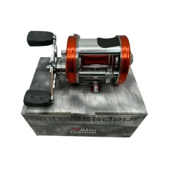 Bait^ Abu Garcia Ambassadeur 6500CS Pro Rocket Sunset Orange Baitcast Reel - Your Premium Fishing Gear Store Rods Lines Baits Accessories